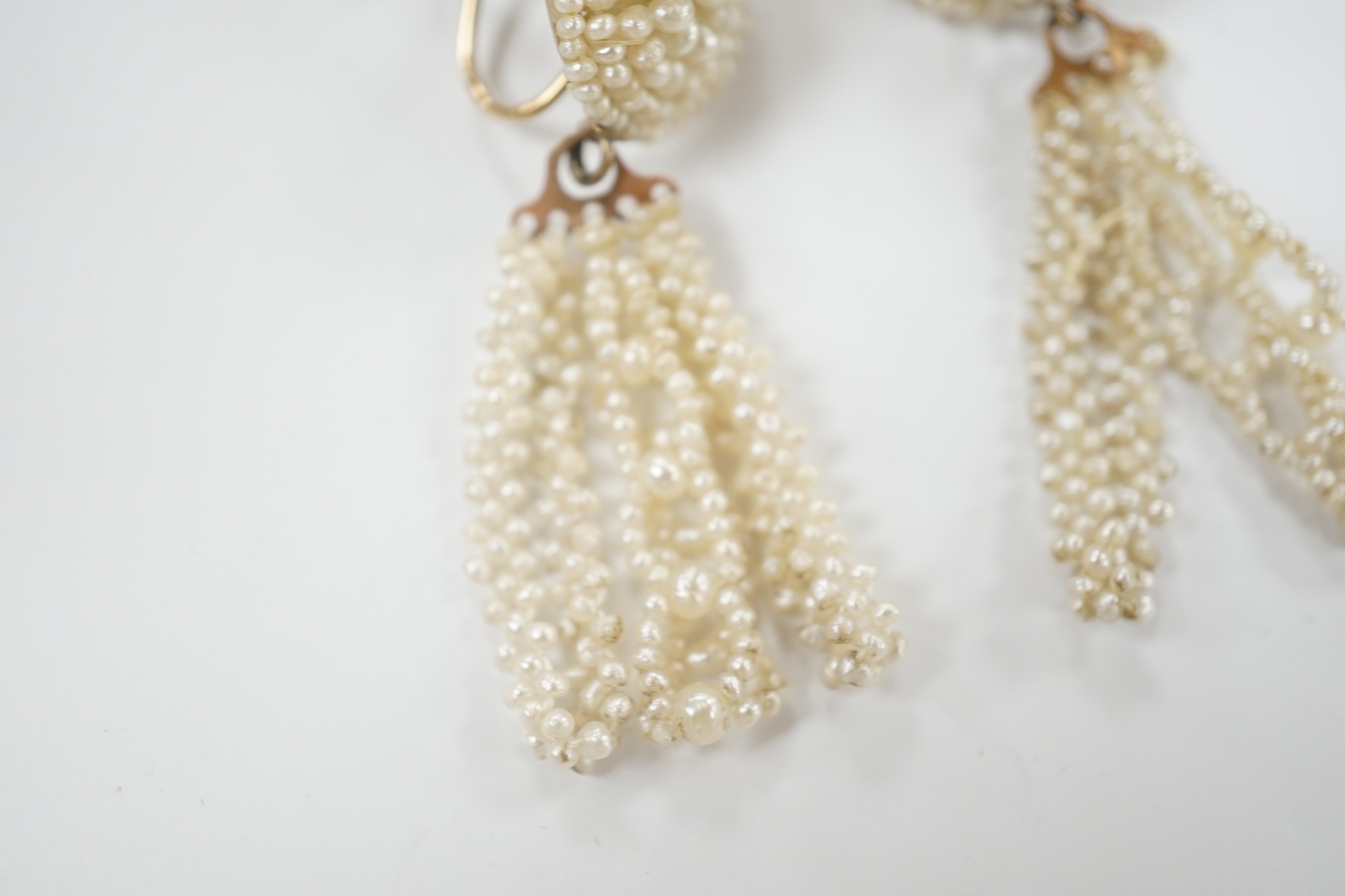 A pair of 19th century yellow metal and seed pearl cluster set tassel drop ear clips, 47mm.